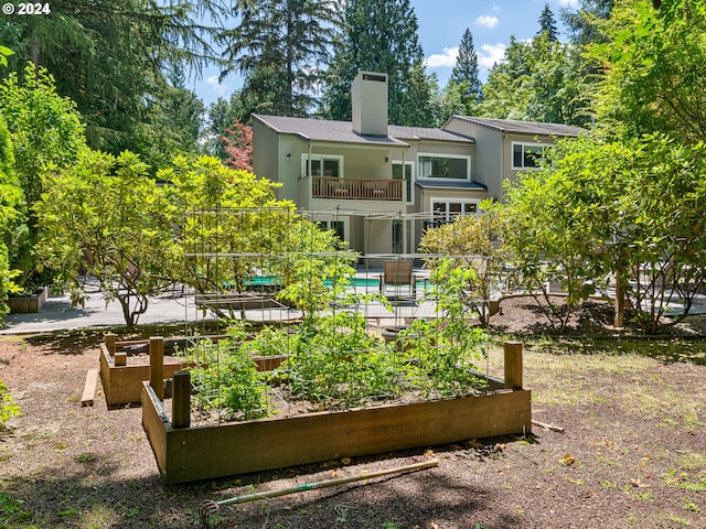 view of yard featuring a balcony