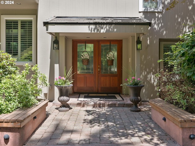 doorway to property featuring french doors