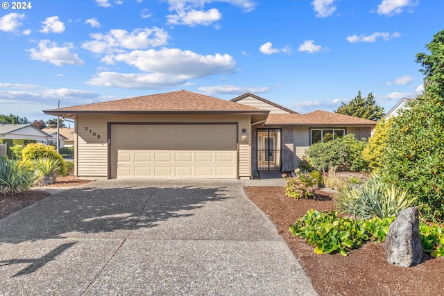 ranch-style home with a garage