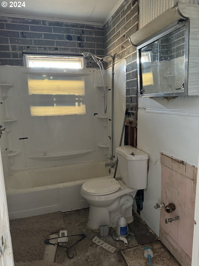 bathroom with toilet and shower / bath combination