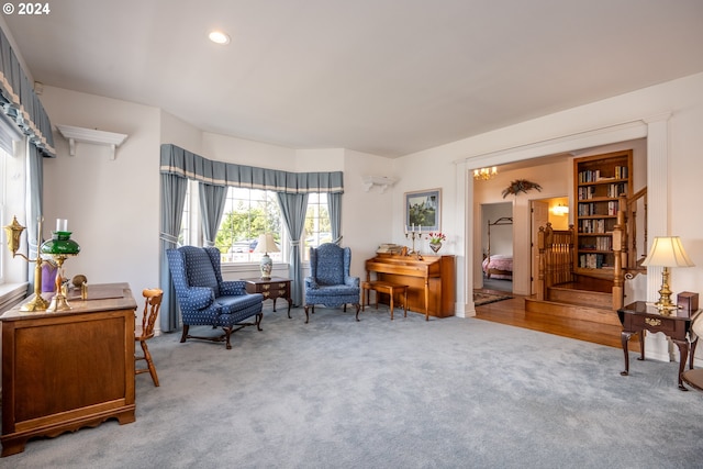 living area featuring carpet and recessed lighting