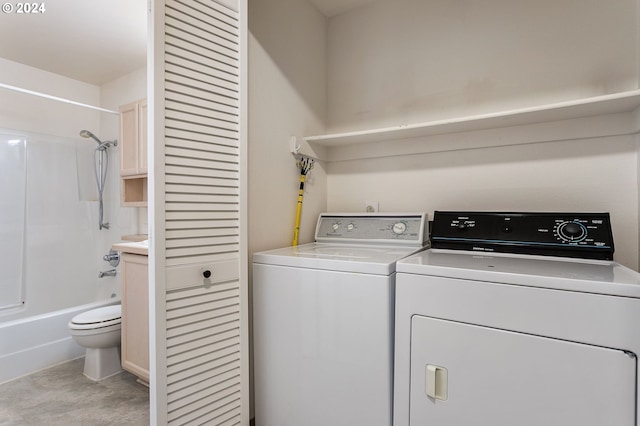 laundry area with washer and dryer