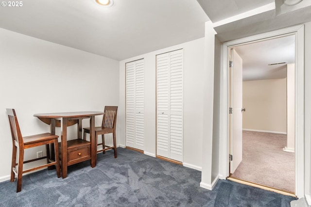 view of carpeted dining space