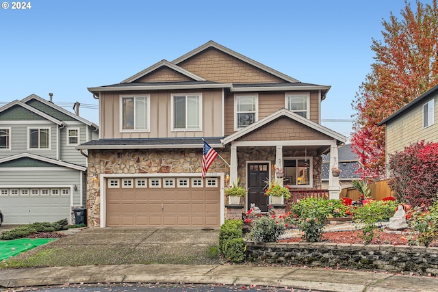 craftsman house featuring covered porch and a garage