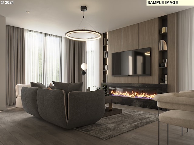 living room featuring dark hardwood / wood-style floors and built in features