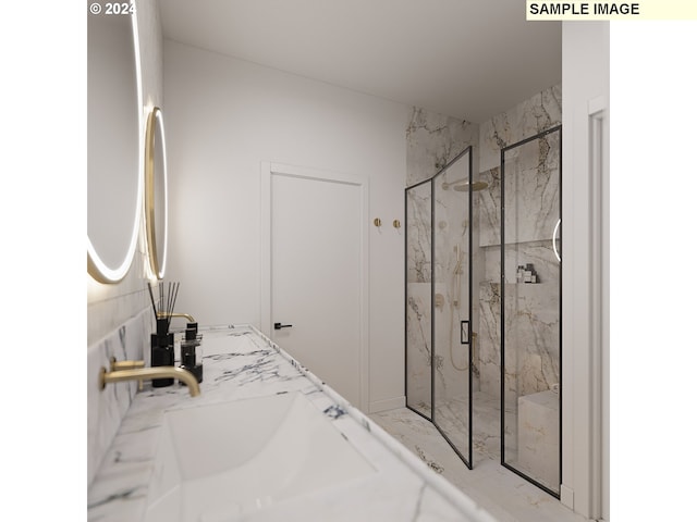 bathroom with vanity and an enclosed shower