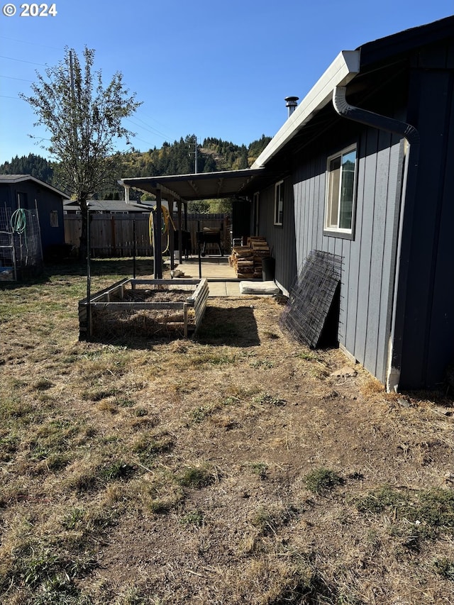 view of yard with a patio area