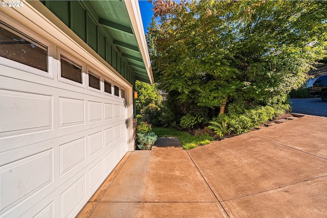 garage featuring driveway