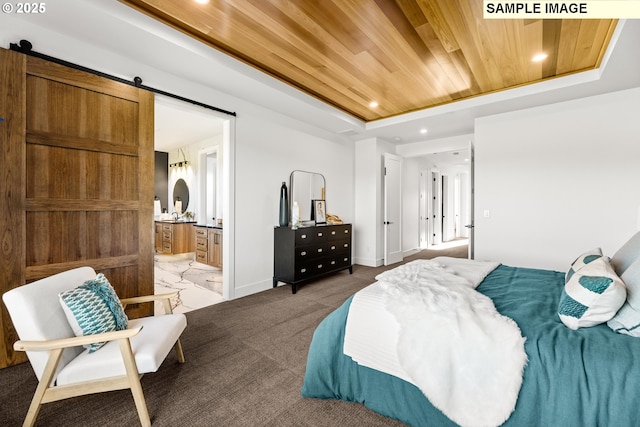 bedroom with carpet, ensuite bathroom, a barn door, a tray ceiling, and wood ceiling