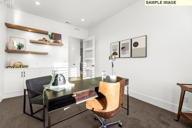 home office featuring dark colored carpet