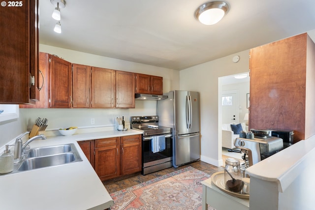 kitchen with sink and stainless steel appliances