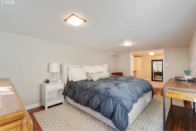 bedroom with light wood-type flooring