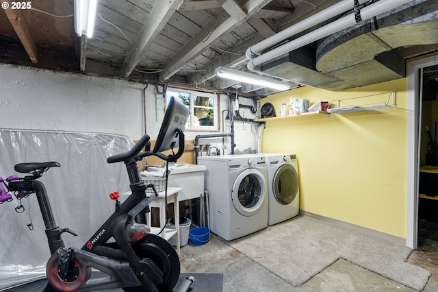 laundry area with separate washer and dryer