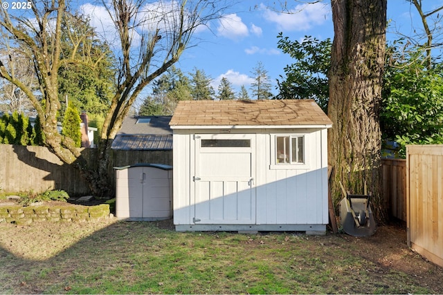 view of outdoor structure featuring a yard