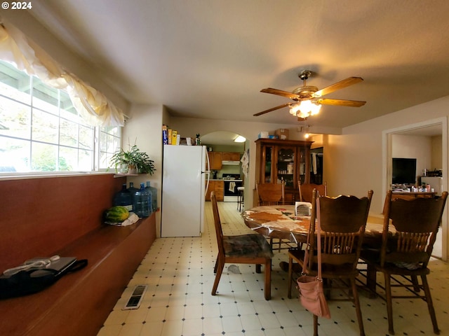 dining area featuring ceiling fan