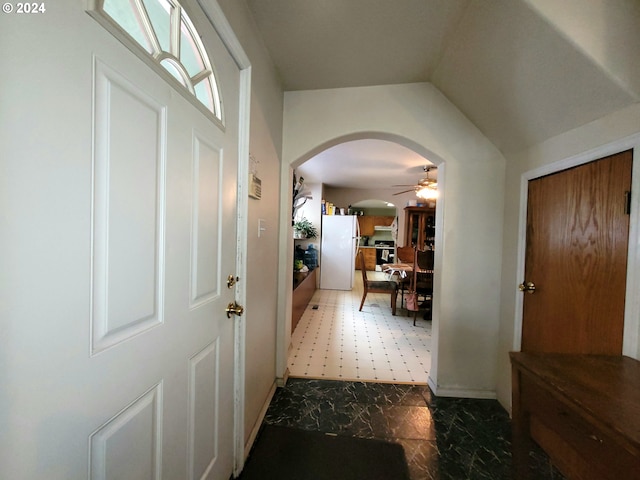 entrance foyer with ceiling fan