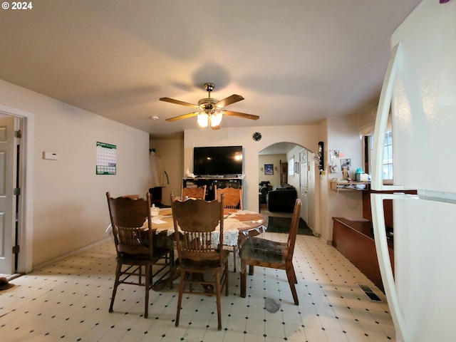 dining space featuring ceiling fan