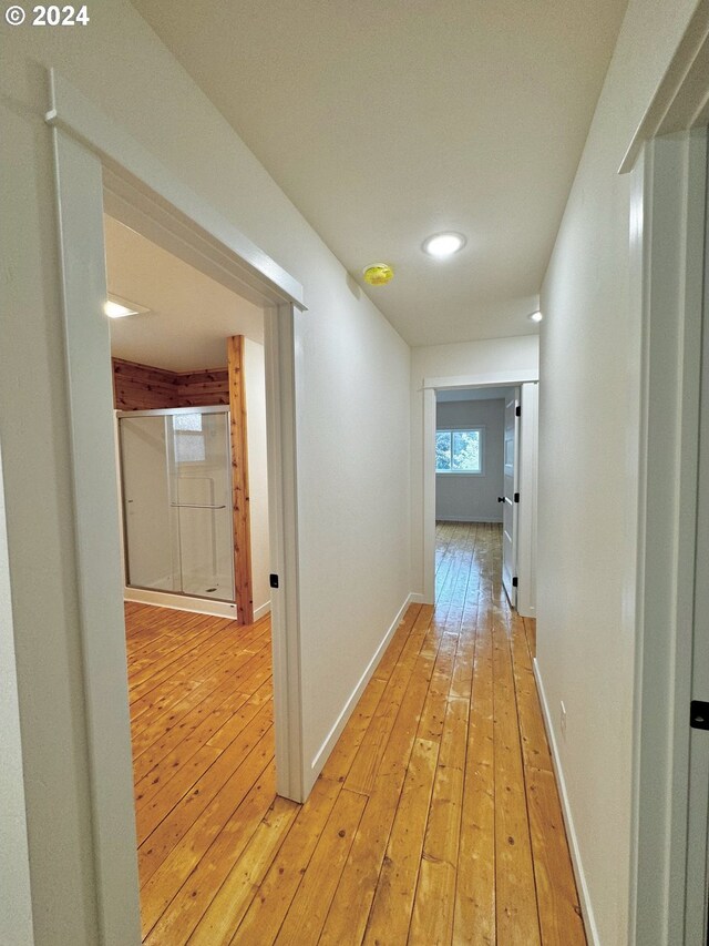 hallway featuring light hardwood / wood-style floors