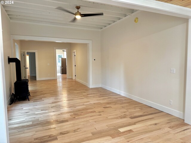 spare room featuring light hardwood / wood-style floors and ceiling fan