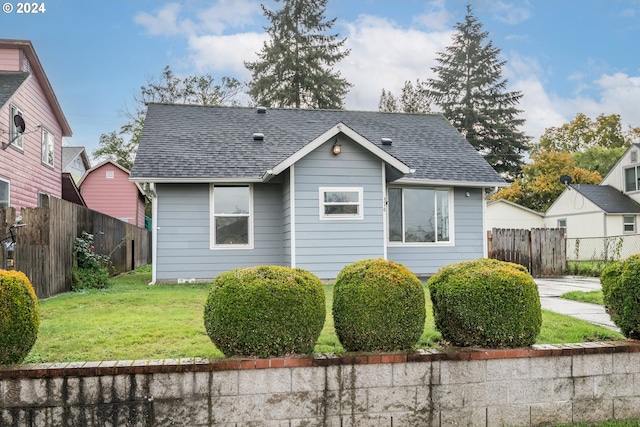 view of front of home with a front yard