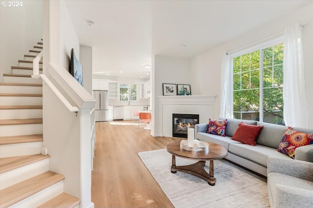 living room with light hardwood / wood-style floors