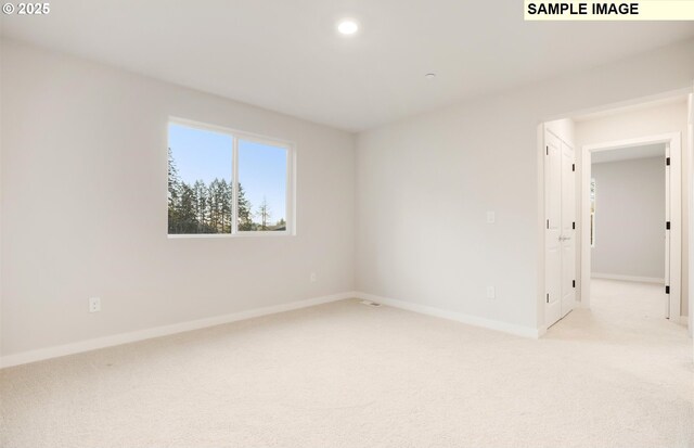 view of carpeted spare room