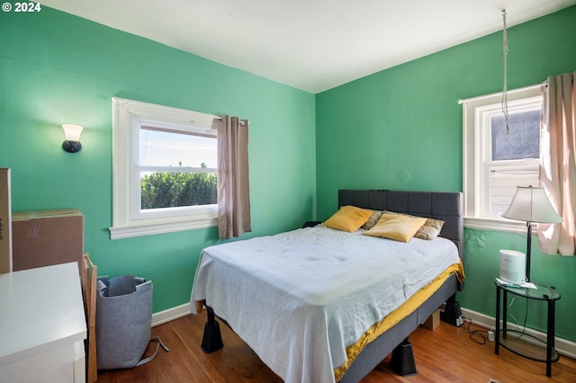 bedroom featuring hardwood / wood-style flooring