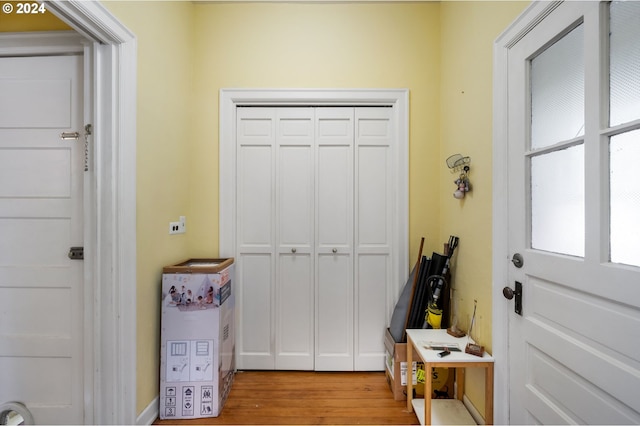 mudroom with light hardwood / wood-style floors