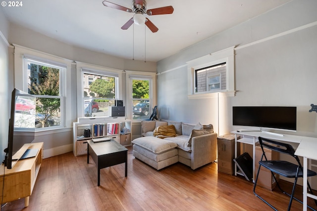 interior space featuring ceiling fan