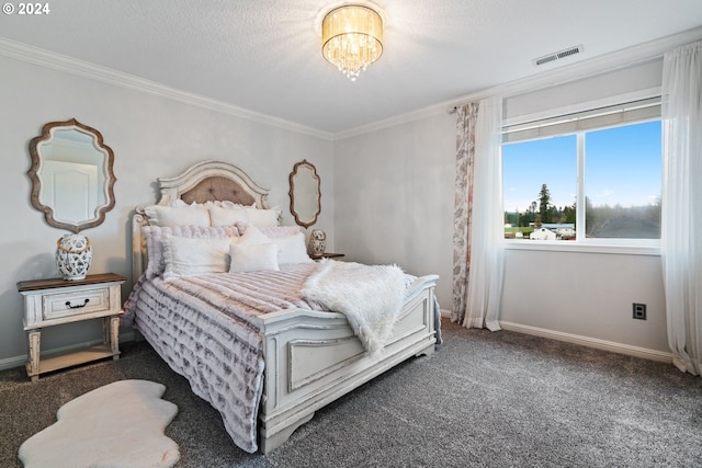 carpeted bedroom with a chandelier, a textured ceiling, and crown molding