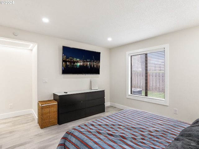 bedroom featuring light wood-type flooring