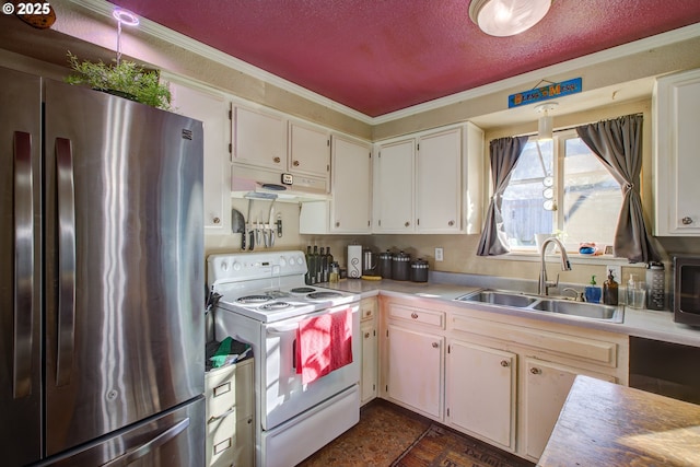 kitchen featuring sink, crown molding, stainless steel refrigerator, white cabinetry, and white electric range oven