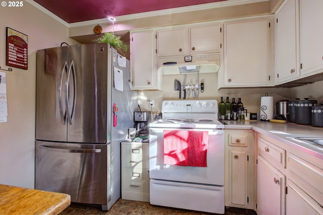 kitchen with white cabinetry, ornamental molding, stainless steel fridge, and white electric stove