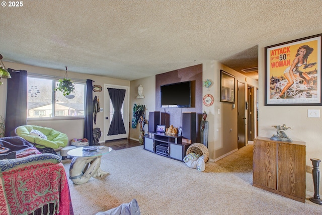 carpeted living room with a textured ceiling