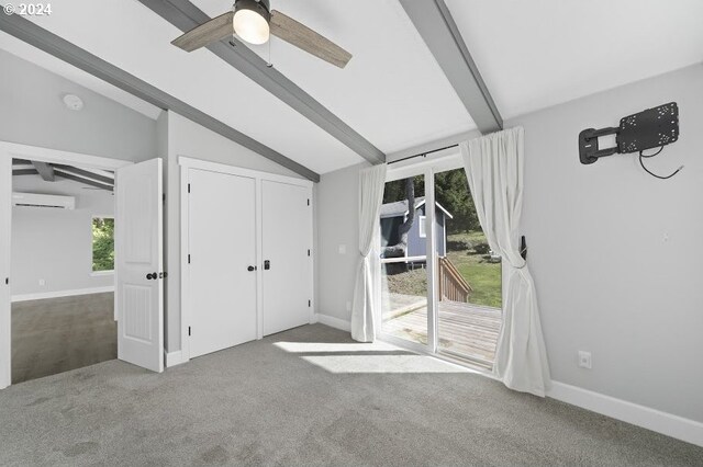 3660 Rocky Creek Ave, Depoe Bay, OR 97341 - unfurnished bedroom featuring a wall mounted AC, carpet, baseboards, and access to outside