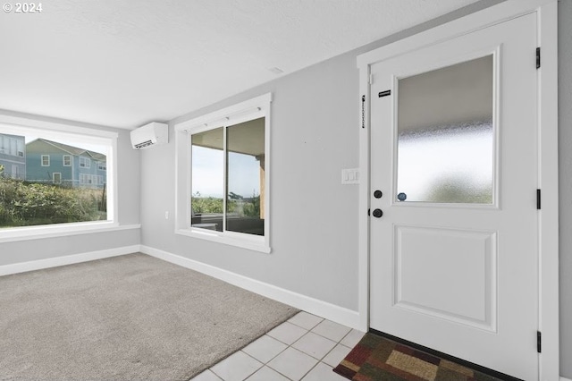 3660 Rocky Creek Ave, Depoe Bay, OR 97341 - entryway with an AC wall unit and baseboards