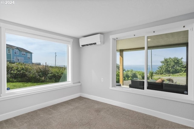 3660 Rocky Creek Ave, Depoe Bay, OR 97341 - empty room featuring baseboards, an AC wall unit, and carpet flooring