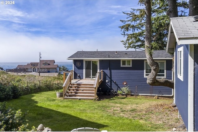 3660 Rocky Creek Ave, Depoe Bay, OR 97341 - back of house with a yard, stairway, and a deck with water view