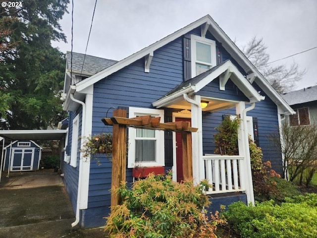 view of front of house with a shed