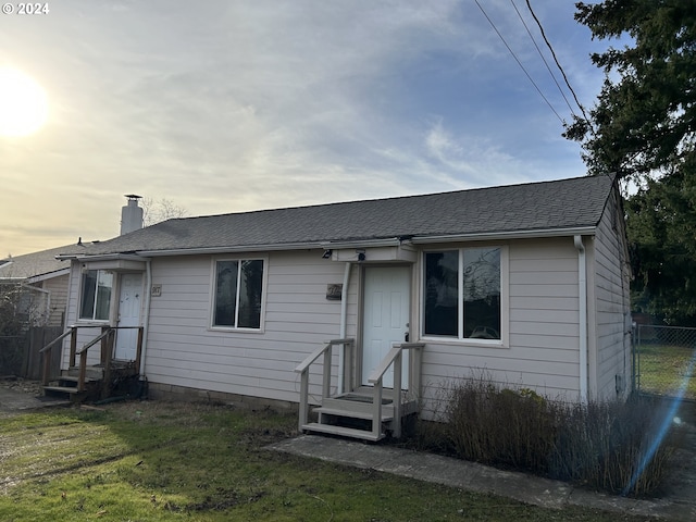 view of front of house with a lawn