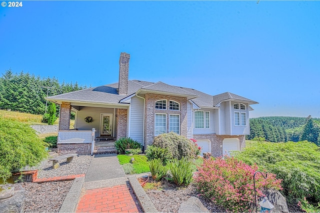 view of front of property featuring a garage