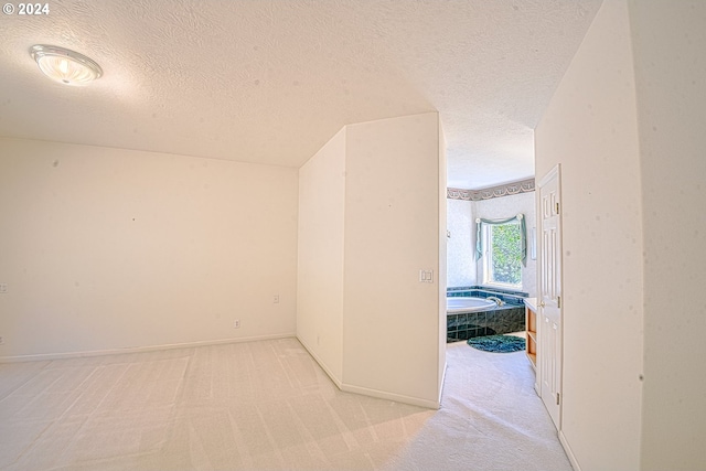 interior space with a textured ceiling