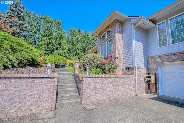 view of home's exterior featuring a garage