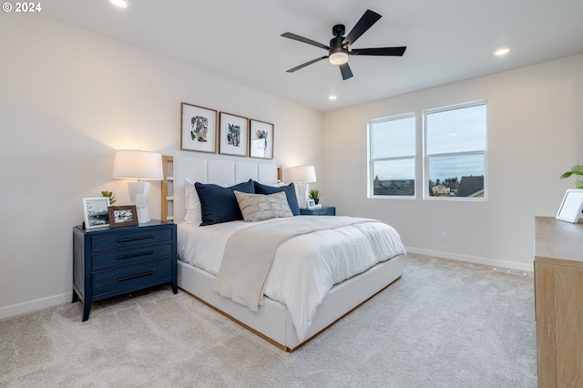 carpeted bedroom featuring ceiling fan