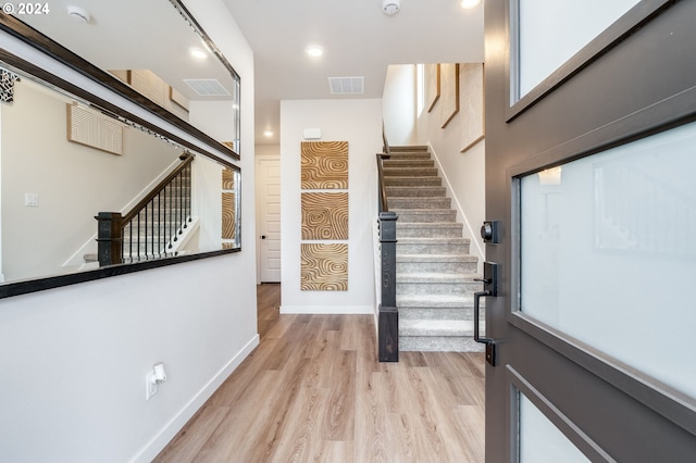 foyer with light wood-type flooring