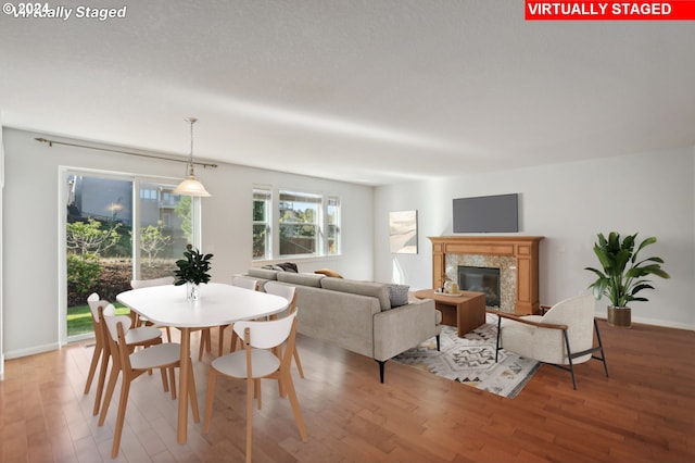 dining area with hardwood / wood-style floors