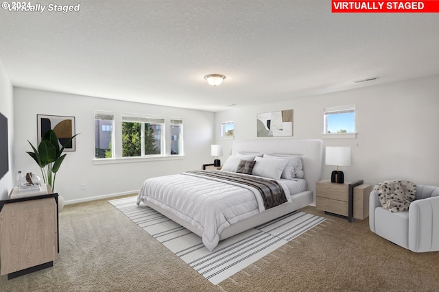 bedroom featuring carpet flooring