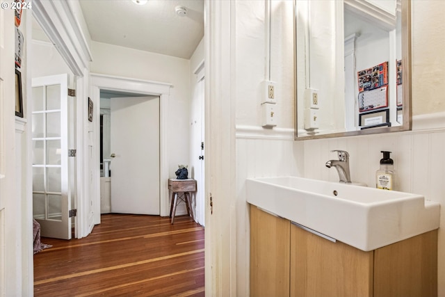 bathroom featuring hardwood / wood-style floors and vanity