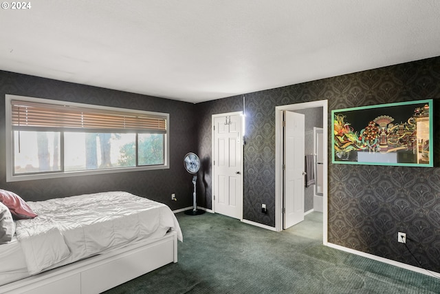 carpeted bedroom with connected bathroom