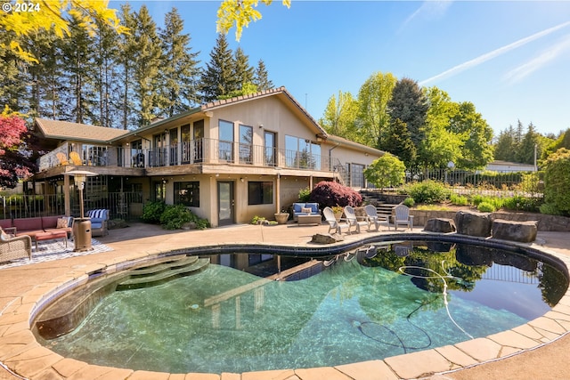 view of pool featuring a patio area